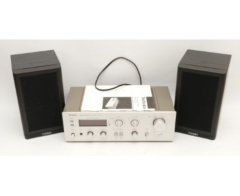 A Technics SU-V2 Hi-Fi amplifier, circa late 1970s early 80s, with AC power lead, operating manual and a pair of Mission 760i