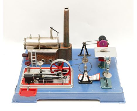 A boxed Wilesco D161 steam workshop, live steam stationary plant with boiler, single cylinder with regulator and a selection 