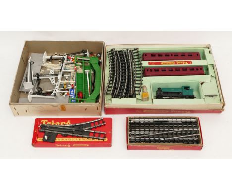 A Tri-ang 00 gauge clockwork model train set, boxed, together with boxed and loose railway track and accessories.