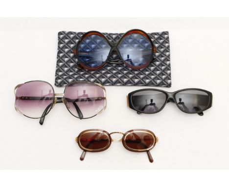 Four pairs of Christian Dior sunglasses, to include, a pair of oversized bubble sunglasses, in pouch, a pair of brown and gil