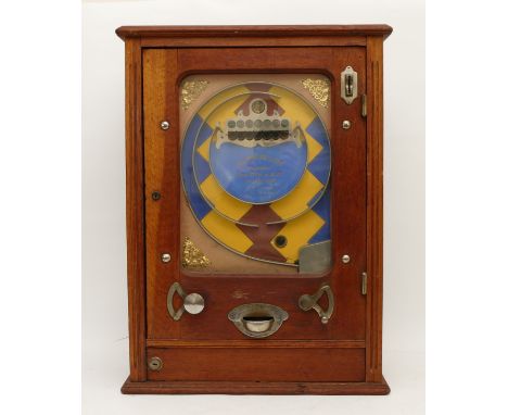 A 1930s Allwin De Luxe 'Penny In The Slot' arcade/amusement machine, wall mount, in oak cabinet with plated fittings, brightl