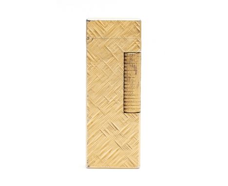 Alfred Dunhill; A Dunhill rollagas pocket cigarette lighter, gold plated having diagonal hash pattern. In very good lightly u