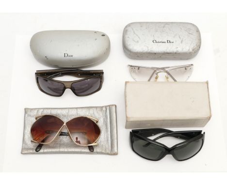 Four pairs of Christian Dior sunglasses, to include, a pair of oversized frames, serial no. 2056 41, in pouch, a pair of dark