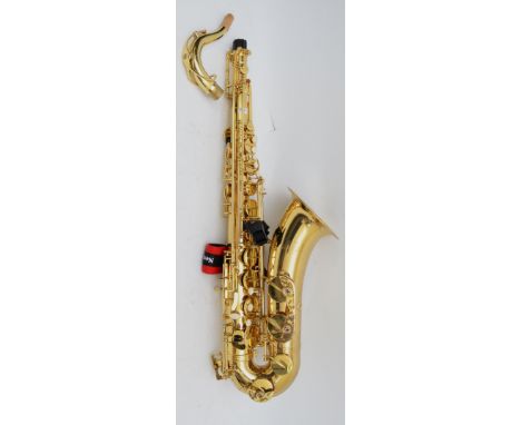 A Roy Benson saxophone, model no. TS-101, complete with case and accessories. In very good condition, showing no dents, dings