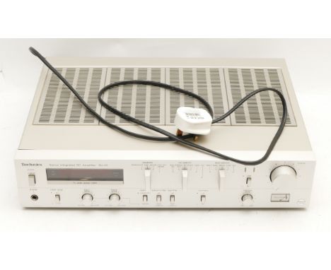 A Technics SU-V5 Hi-Fi amplifier, circa late 1970s early 80s, with AC power lead. Tested with turntable (phono stage) fully w