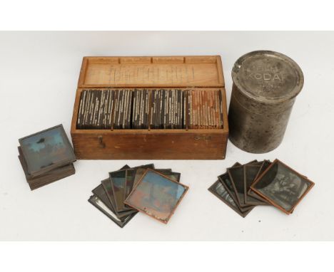 Magic Lantern Slides, together with a Kodak Film Developing Tank: Printed and Illustrated Scenes: A collection of 83 glass la