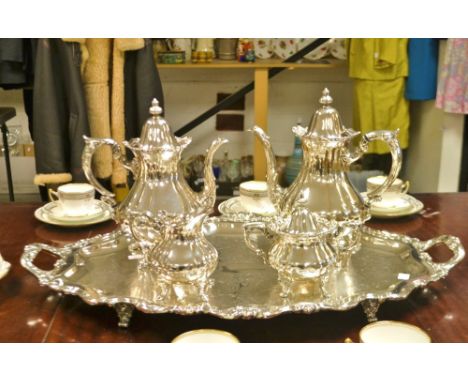 A Wallace four piece plated tea service on twin handled shaped tray