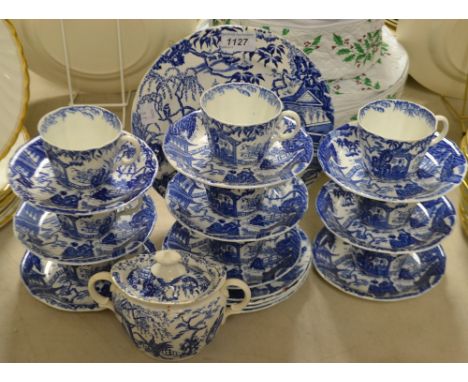 Royal Crown Derby- a Mikado patterned blue and white tea service including bread plate, sucre and cover, cups, saucers etc. g