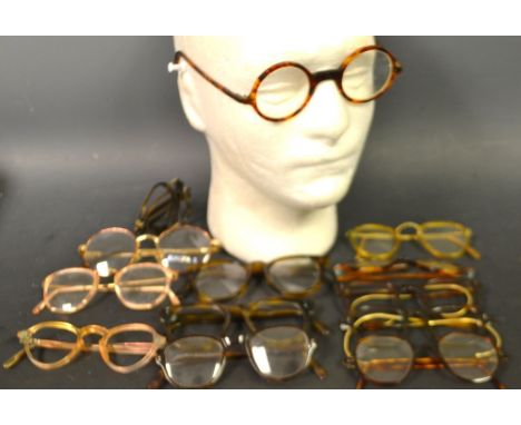 Vintage Spectacle - a pair of faux tortoiseshell round spectacles, 12.2cm wide, c. 1930; another pair, similar, smaller, 12cm