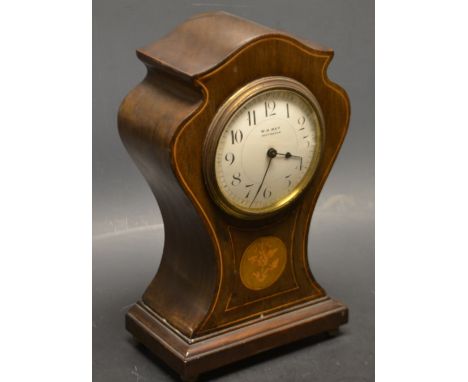 An Art Nouveau mahogany balloon shaped mantel clock, inlaid with circular paterea, c.1905