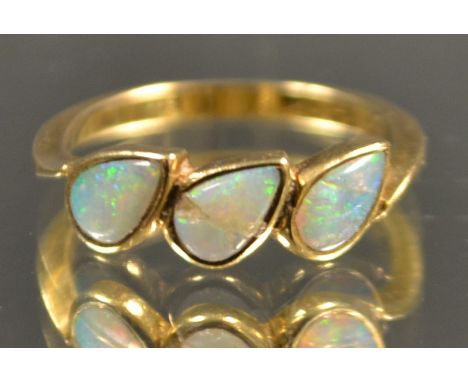 A 9ct gold and opal three stone dress ring, size K, 1.5g gross