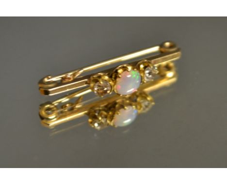 A diamond and opal bar brooch, 9ct gold mount