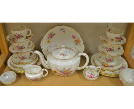 A Royal Crown Derby posies pattern tea service for six including teapot, cups, saucers,cake plate, side plates etc, printed m