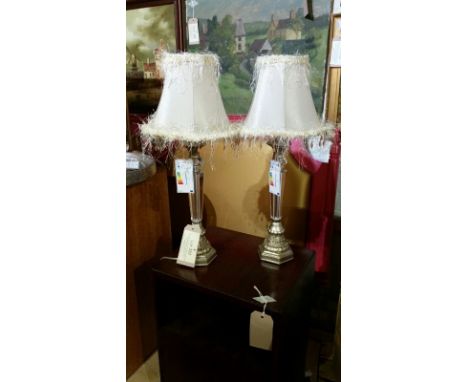 Pair of decorative acrylic and light gold resin table lamps with cream satin shades and decorative beaded trim. Overall heigh