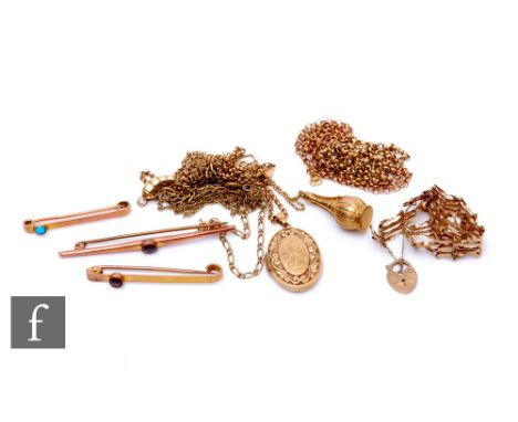 A parcel lot of 9ct jewellery to include a locket and chain, bar brooches and a gate bracelet, total weight 35.5g, some damag