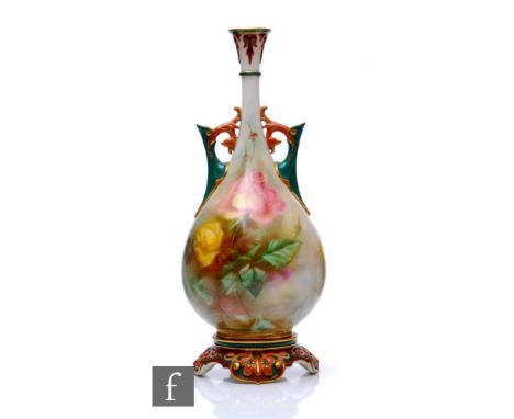 A Hadley's Worcester vase or baluster twin handled form, decorated with pink and yellow roses, on foliate and scroll moulded 