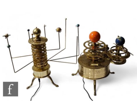 Two brass planetarium Orrery's constructed in parts, by 'Builda model solar system', magazines and DVD. (2)  PLEASE VIEW COND