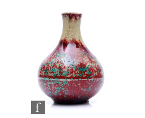 A French Art Nouveau P. Lame art pottery vase of globe and shaft form with a tapered neck, decorated in a high fired glaze wi