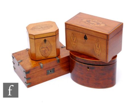 A 19th Century rectangular inlaid mahogany tea caddy, decorated with floral decorated paterae, a similar single caddy, an ova