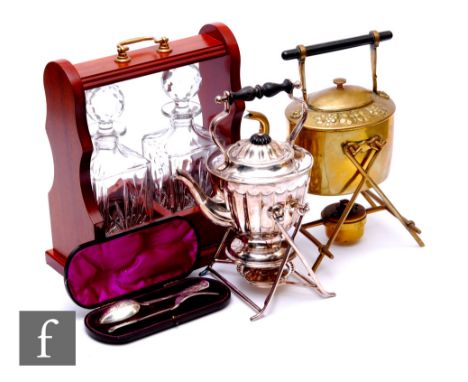 A Victorian cased two piece silver christening fork and spoon, a plated spirit kettle on stand, a brass spirit kettle on stan