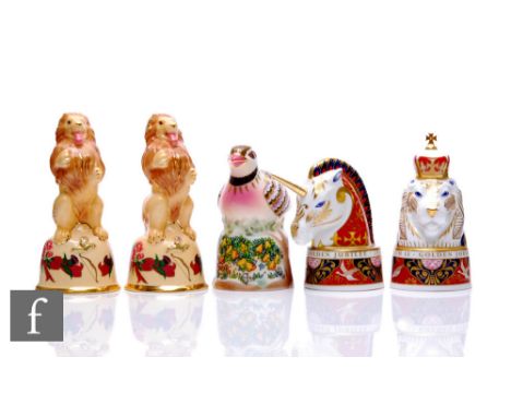A collection of later 20th Century Royal Worcester candle snuffers, comprising the Lion and the Unicorn, a pair produced for 