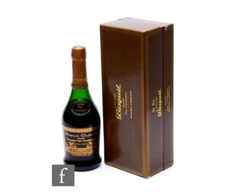 A bottle of Bisquit Dubouche Extra Vieille Grande Champagne Cognac, 1980s bottling, 70cl, in original box.  PLEASE VIEW CONDI