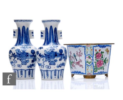 A pair of Chinese Kangxi style blue and white 'Arrow' vases, each of baluster form, decorated with precious object, below sti
