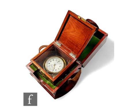 A post 1950s Russian marine chronometer, No 891-77, in mahogany glazed case with outer case and strap, width 19cm.  PLEASE VI