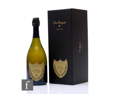 A bottle of 2004 Dom Perignon champagne, with original box and leaflet, 75cl.  PLEASE VIEW CONDITION REPORT 