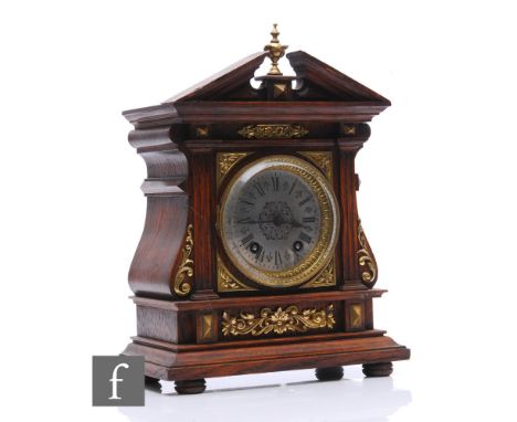 An Edwardian oak cased mantle clock, applied brass decoration, eight day Lenzkirch striking movement, in architectural case, 