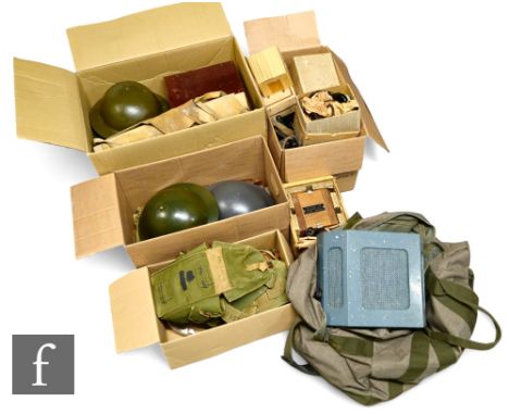 A World War Two mahogany cased telephone operators exchange set, width 31cm, a small field exchange set, various ebonite head