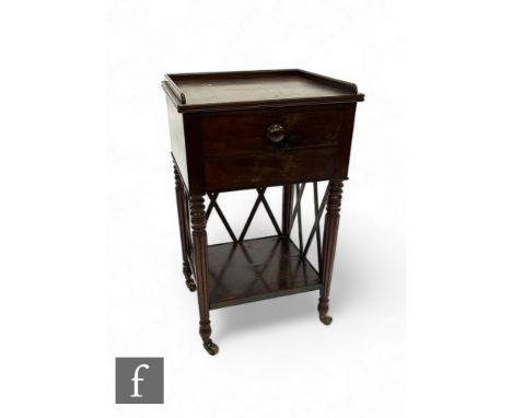 A George IV mahogany tray top bedside cupboard with dummy drop flap door on ring turned reeded legs and cross slat back and s