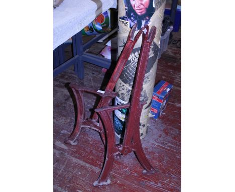 A pair of reversible cast metal bench ends from a tram. Postage unavailable 