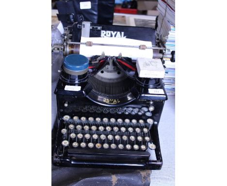 A vintage Royal typewriter in working order.  Postage unavailable 