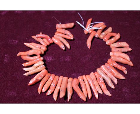 A string of vintage coral fingers 