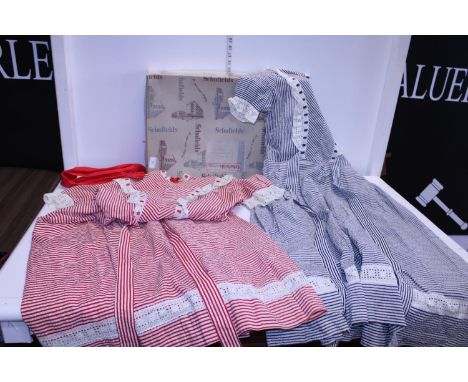 Two vintage ladies dresses retailed by Schofields with original box 