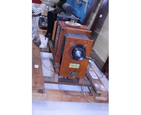 A antique magic lantern converted for electric use. Made by Thornton Pickard of Altringham. Air Ministry 14A/1101 and W.Watso