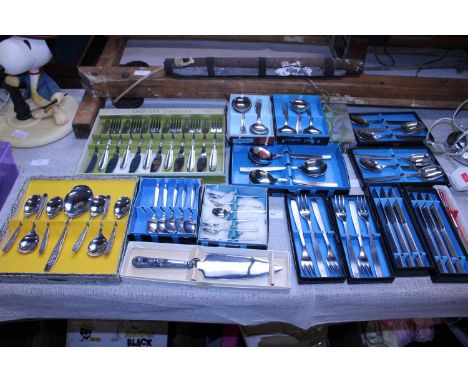 A large selection of vintage boxed flat ware 