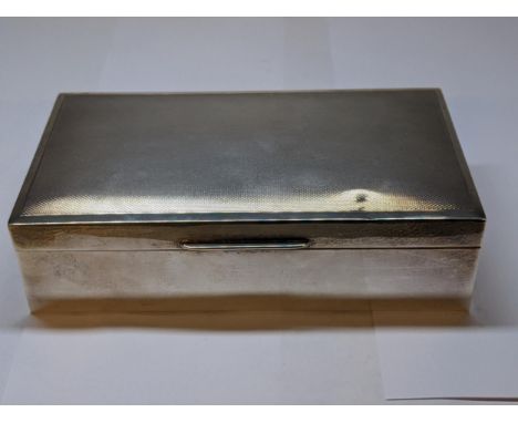 A late 20th century silver cigarette box with engine turned decoration, 15.5cm wLocation: 