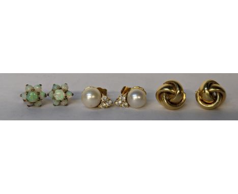 Three pairs of 9ct gold earrings to include a pair of cluster opal earrings, total weight, 11.1gLocation: 