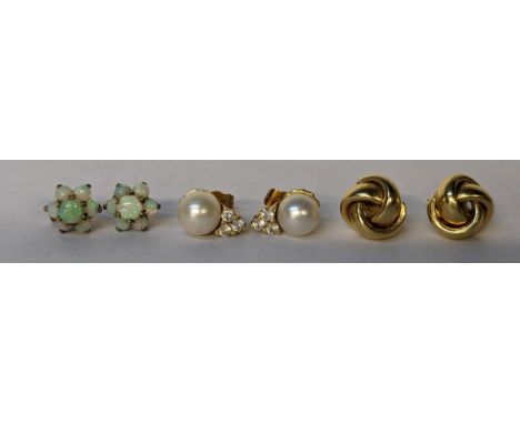 Three pairs of 9ct gold earrings to include a pair of cluster opal earrings, total weight, 11.1gLocation: 