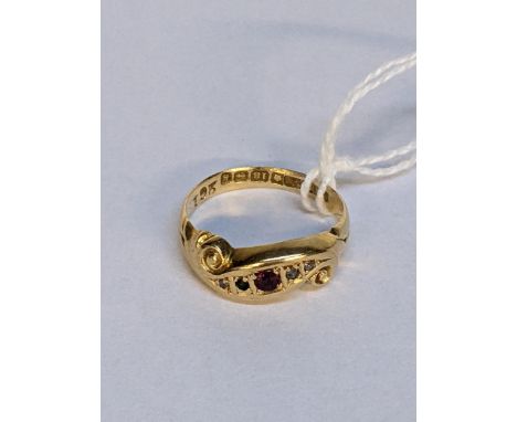 A 18ct gold ring set with a ruby and diamond chips, 2.7gLocation: 