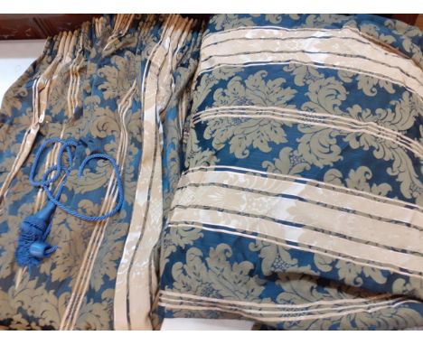 A pair of blue and cream curtains with gathered heading, each curtain measuring 100cm w x 116cm drop together with a matching