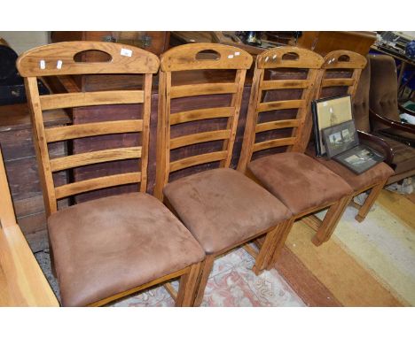Set of four modern oak ladder back dining chairs