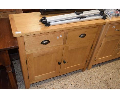 Modern light oak two door two drawer sideboard, 90cm wide