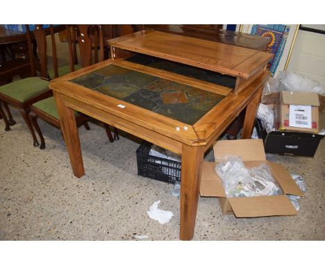 Modern oak extending dining table with tile inset