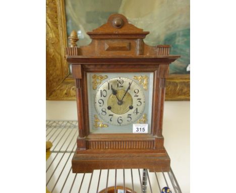 Oak 8 day mantle clock striking on a gong 8 day movement 
