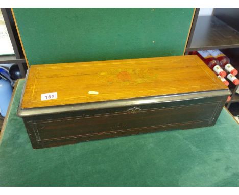 Superb 19c Swiss music box, playing on 12 Airs, probably by Nicole Freres, in fine quality ebonise and rosewood case with inl
