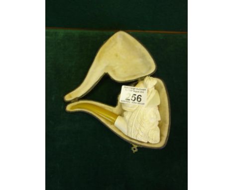 Collectable Meersham pipe, with an amber coloured handle, the top section carved and modelled as a bearded Cavalier with orig