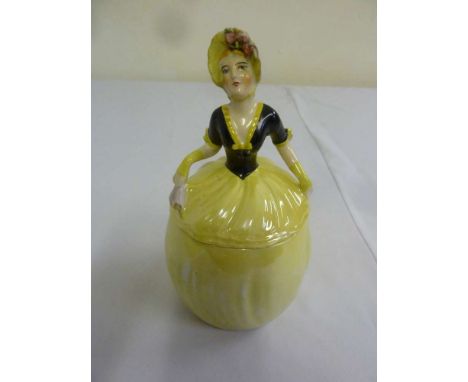 Carltonware biscuit barrel in the form of a lady with pull-off cover